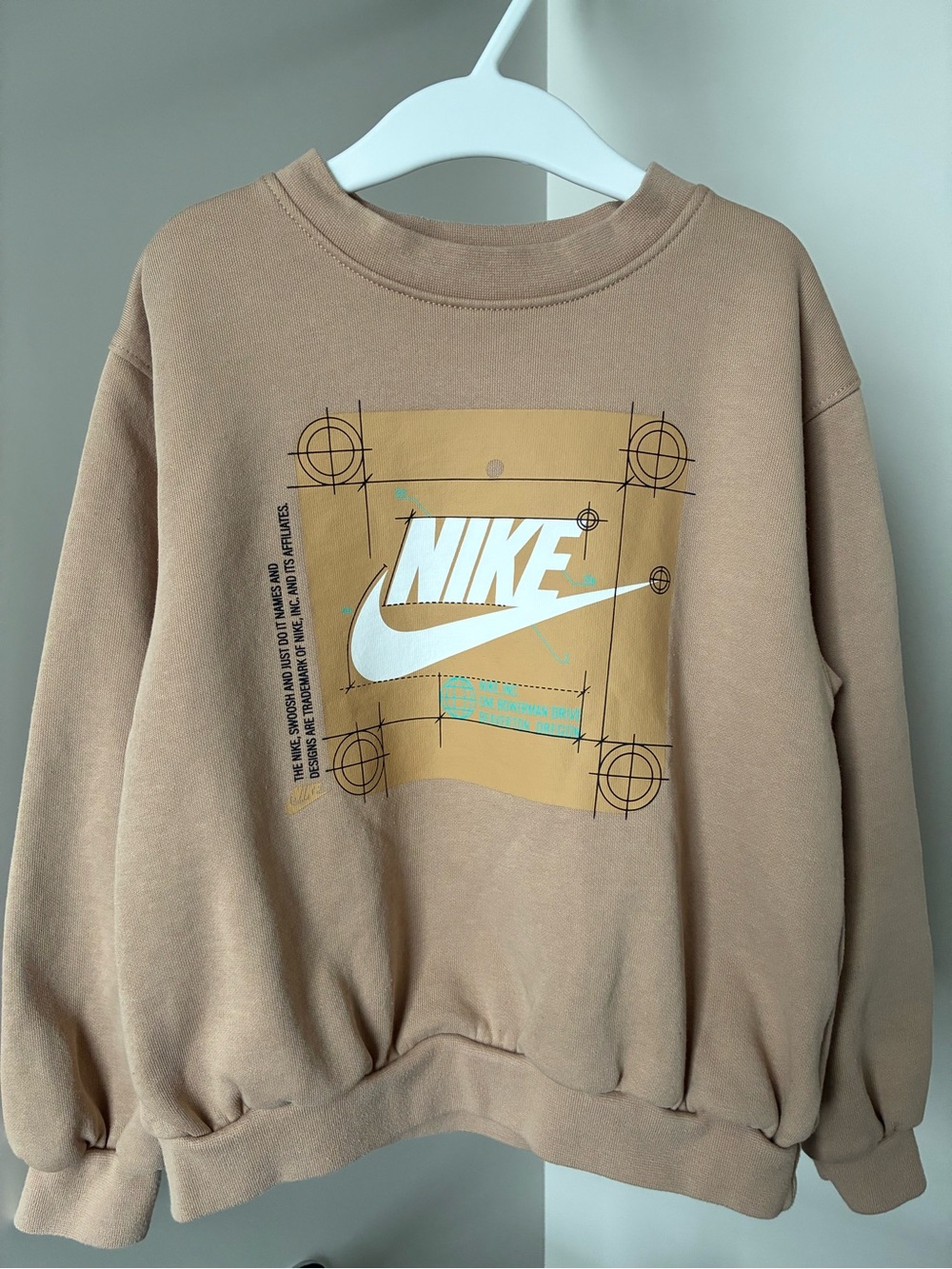 Nike Kid’s Tan Crewneck Sweatshirt with White Logo